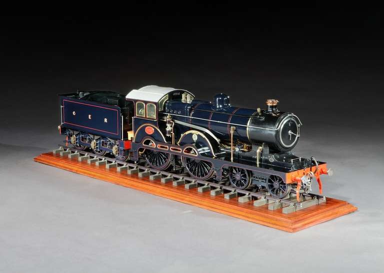 63 inches long! An exhibition standard, 5 inch gauge model of the Great Eastern Railway tender locomotive of 1900, Claud Hamilton built in 1973. Finished in lined Royal Blue livery with vermillion detailing, polished brass beading on the decorative