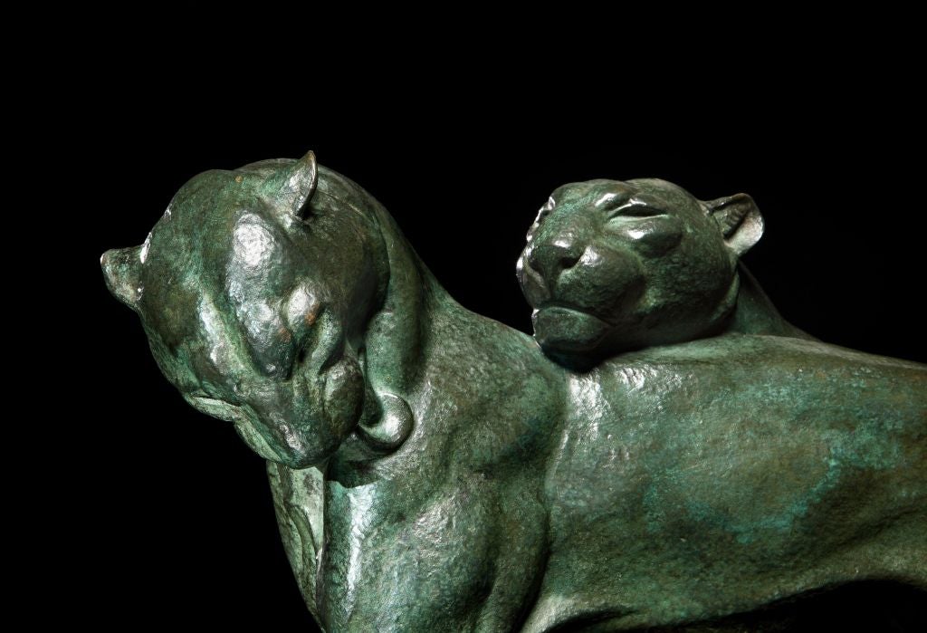 A patinated bronze and marble sculpture of two panthers on a bronze sôcle, the whole mounted on a marble plinth.  Signed BECQUEREL in the bronze.  

Notes: André-Vincent Becquerel was acknowledged as a sculptor of considerable natural ability, he