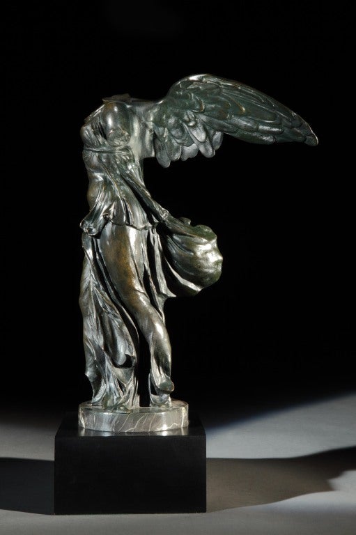 The Winged Victory of Samothrace - a finely cast showroom bronze mounted on a marble socle and wooden plinth. French, circa 1910. Bearing G. NISINI ROMA foundry marks. 

Notes: Richard Brasier manufactured high-performance chain-driven racing cars