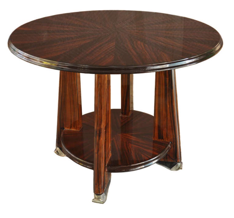 Wonderful pair of Art Deco side tables with segmented top and chrome feet.