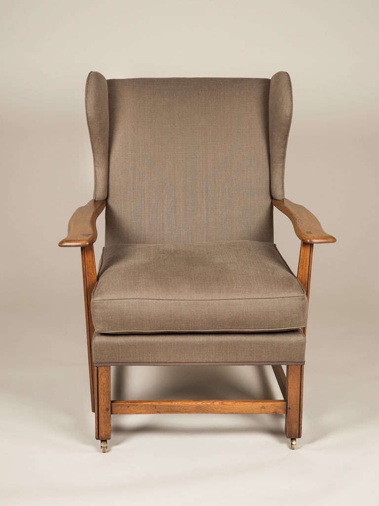 A Pair Of 1930s Oak Framed Cotswold School Wing Armchairs (20. Jahrhundert)