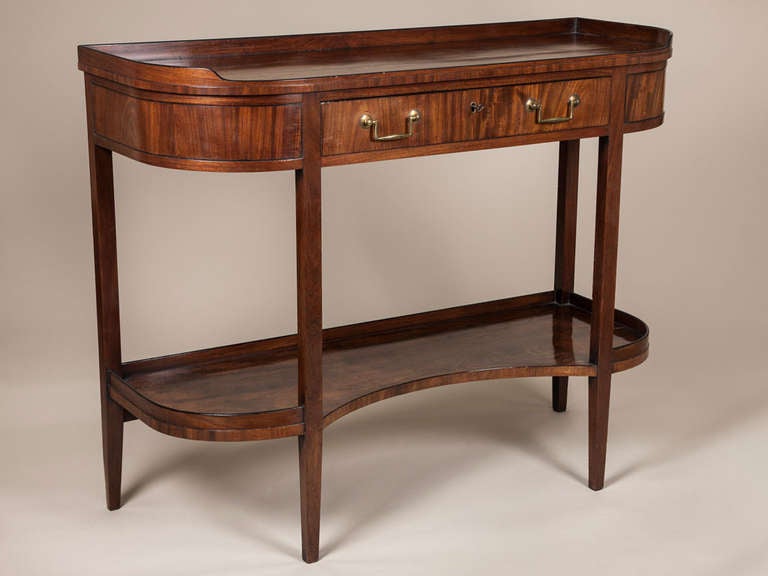 A Continental mahogany console desserte with a single drawer and two tiers, c.1800
