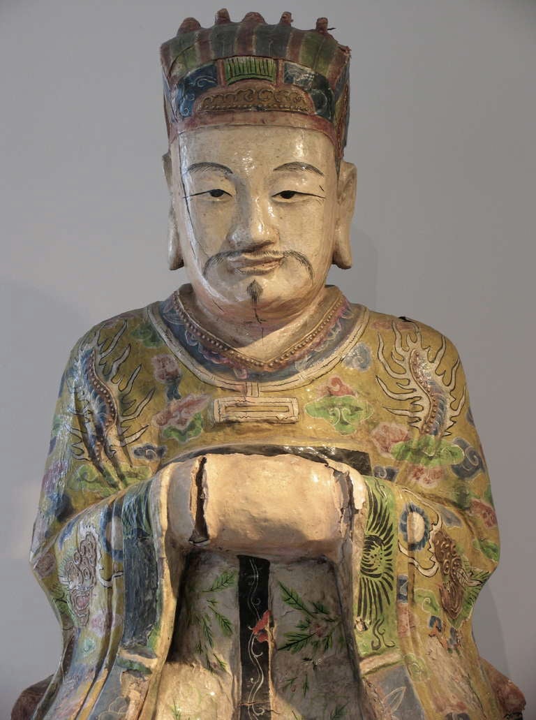 Wooden sculpture of Zheng Ho who led a fleet of 100 ships circumnavigated the globe March 1421 to October 1423 - about 70 years before Columbus. He explored the coasts of Africa, South America and Australia and sailed into the Caribbean and the Sea