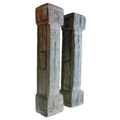 A pair of long grey pillars from Han Dynasty.