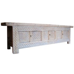 Long low cabinet from Shinjianag Province, China.