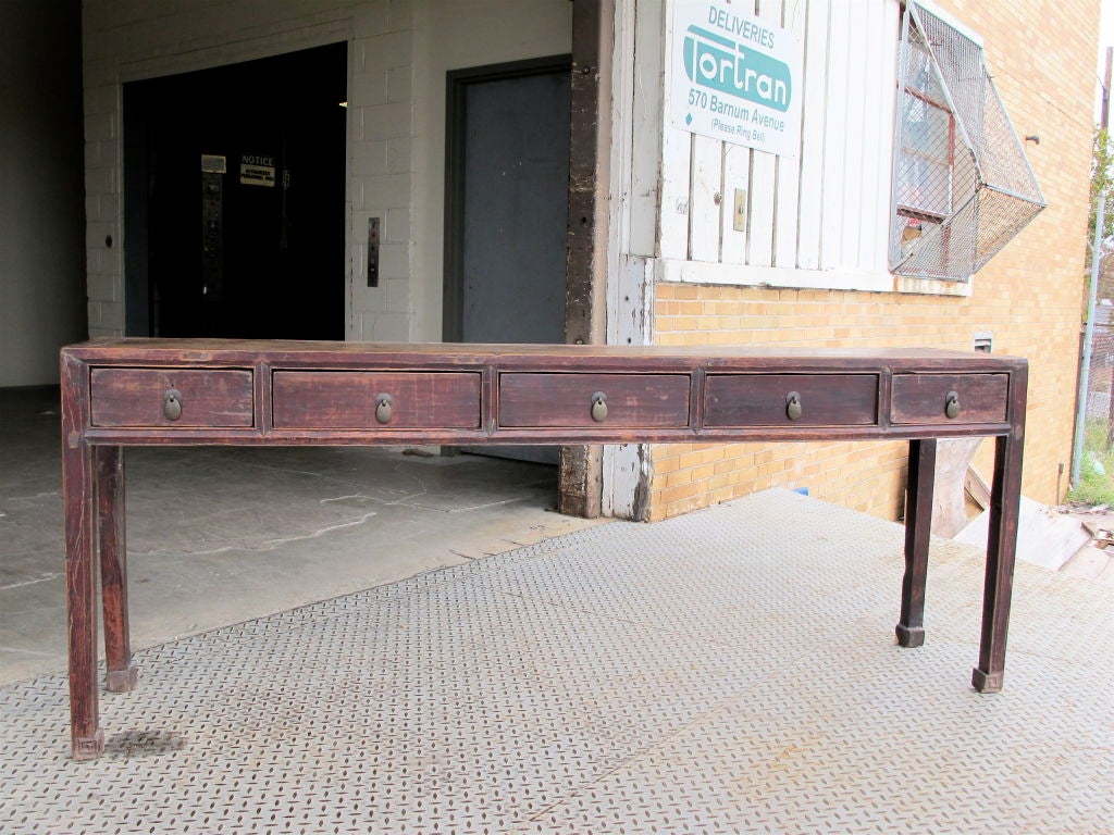 A long table from Northern China. Elm wood construction. Beautiful weathered condition.