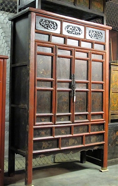 A rare, extra large painted armoire from Norther China. Elm wood construction. Original iron hardware and organic lacquer finish. Rare and quality piece of  antique Chinese furniture.
