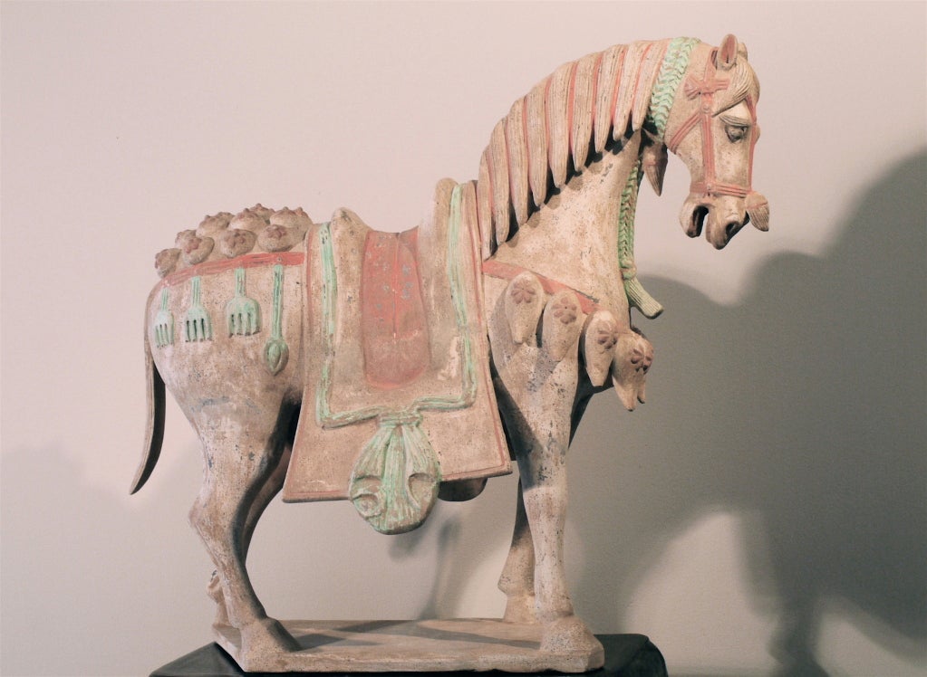 A painted pottery horse from the Northern Wei Period (386-535AD)<br />
Beautifully sculptured with most of the original pigments. Restorations in areas of saddle and legs. Color closer to images 1,2,3 rather than 4,5,6. <br />
 T.L. Analysis by