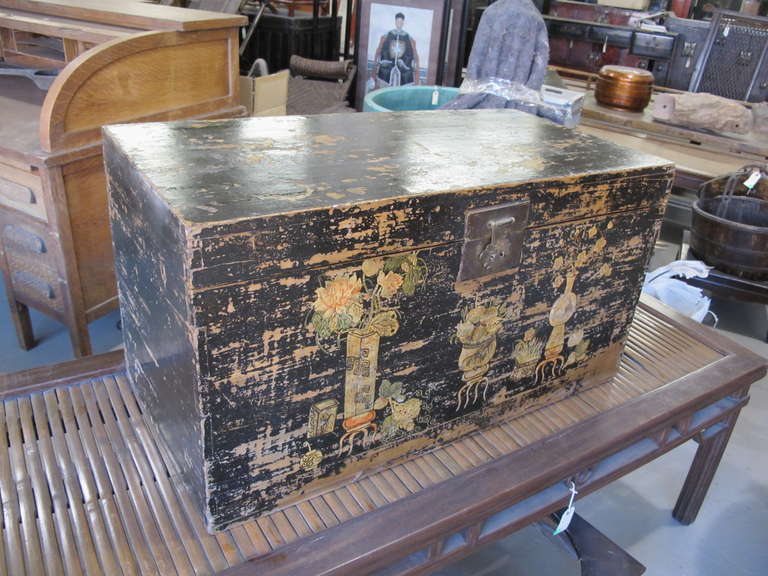 A large painted storage trunk from Southern China, Original painting, bronze locking panel. Nice clean interior.