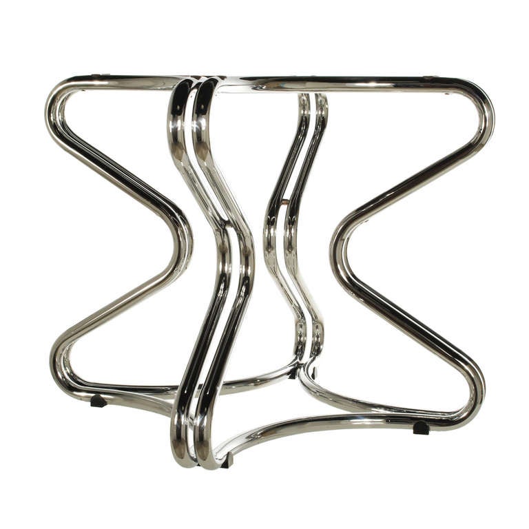 This striking double X-form dining table base made of heavy chrome tubular steel is attributed Gianfranco Frattini. Both Italian designers Gianfranco Frattini and Giotto Stoppino are well known for their chrome tubular designed furniture. The base