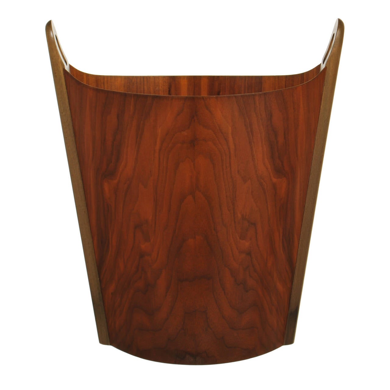 This lovely Danish design wastepaper basket was designed by Einar Barnes and manufactured by P. S. Heggen of Norway. This one is more unique than most as it is two-tone, with a walnut basket and beech? Handles. This is the perfect accessory for the