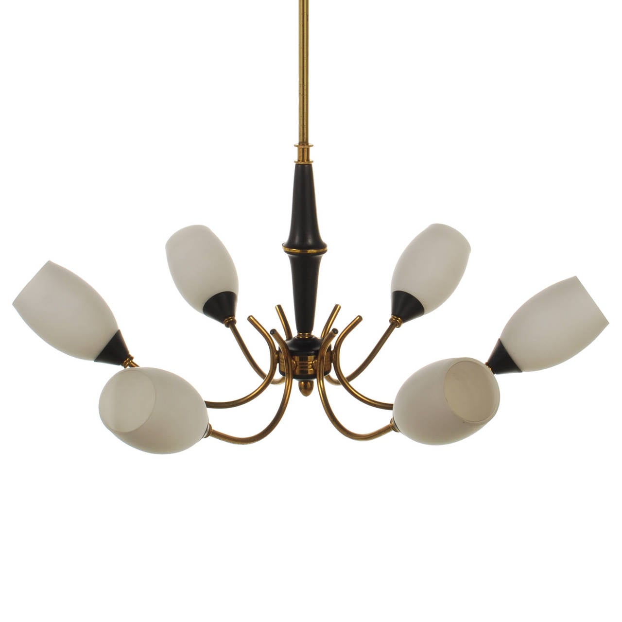 This is a splendid Mid-Century Modern Italian chandelier by Stilnovo. The brass has its original warm patina which looks very nice against the dark enamel details of the chandelier. It has six arms with white frosted shades on the ends. One shade
