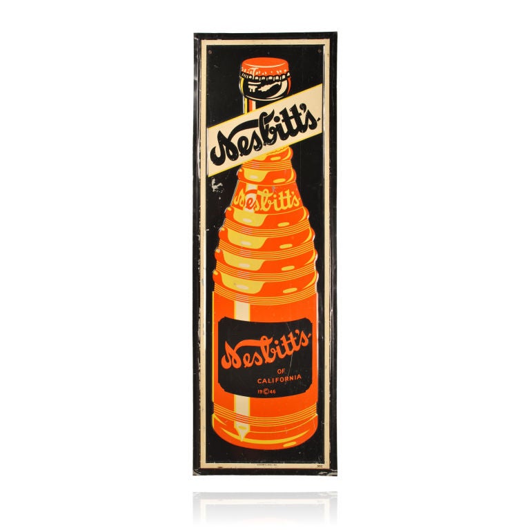 This is a large Nesbitt's of California metal sign with the iconic image of their distinctive bottle of Orange Soda. The sign has an embossed bottle and Nesbitt's banner and is marked copyright 1946 and was made by the Mathews Company of Detroit,