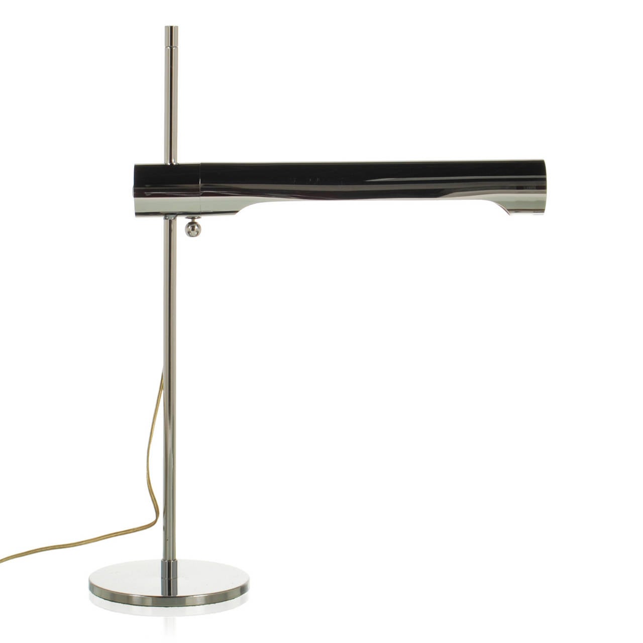 Handsome pair of late Mid-Century Modern desk lamps in chrome. These are very well made and have adjustable lamps that slide up or down the post. Although similar to a lamp made by Walter Von Nessen, we attribute these to Robert Sonneman due to the
