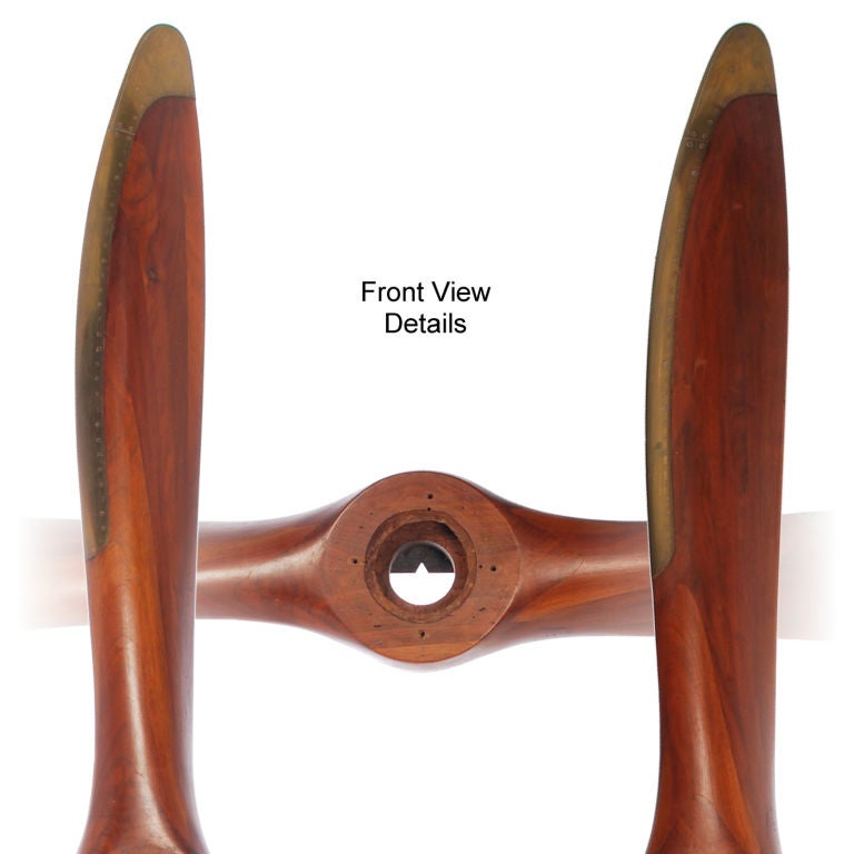 This is a very nice authentic 1920's wood propeller for a Hispano-Suiza Engine. The color is rich and beautiful and the blade and tips are excellent. The hub is stamped with the following:<br />
300PS, Haspano, D250, H210, Heine, 38794 and D11 to