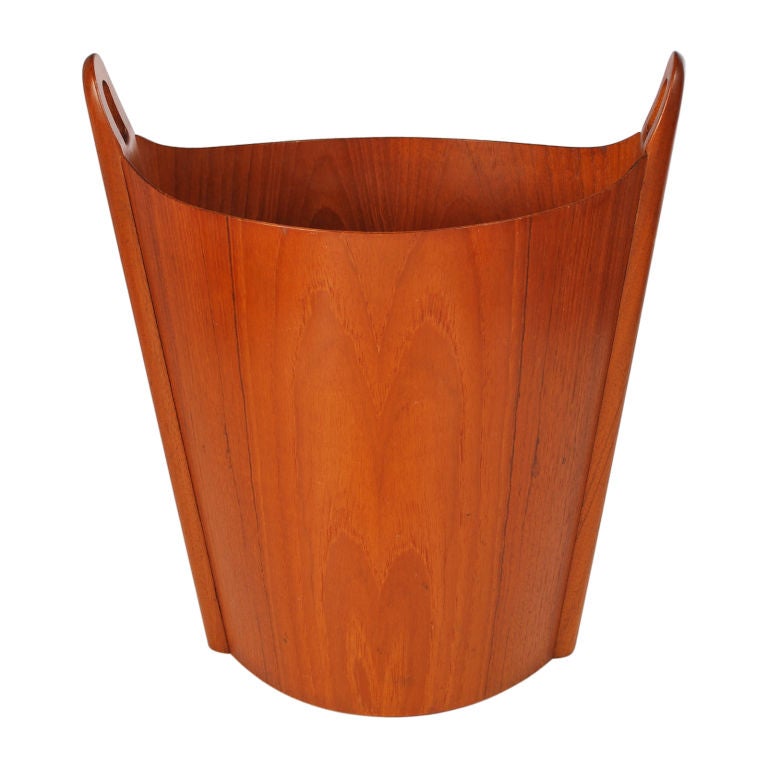 Teak Waste Basket by P. S. Heggen of Norway. Looking for that perfect piece to go with your Danish or Mid Century Modern home? Well here it is. With its sculptural look and elegant design, this wastebasket looks like a piece of art.
Heggen's signed