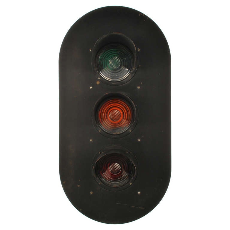 This is an authentic railroad signal light switch, with three colored lenses, green, yellow and red. The condition is very nice and appears to be all in tact. This would make a great display piece for a restaurant or bar. A perfect gift for the