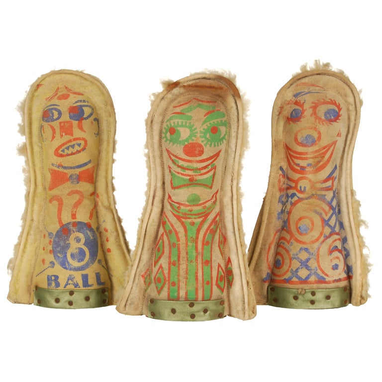 A Collection of Three Knock Down Dolls