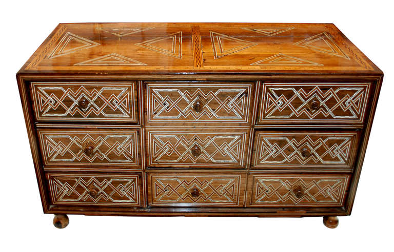 Late 19th Century, Rosewood Vargueño with inlaid design from Peru with seven drawers (five small drawers, one vertically oriented drawer, one horizontally oriented drawer).