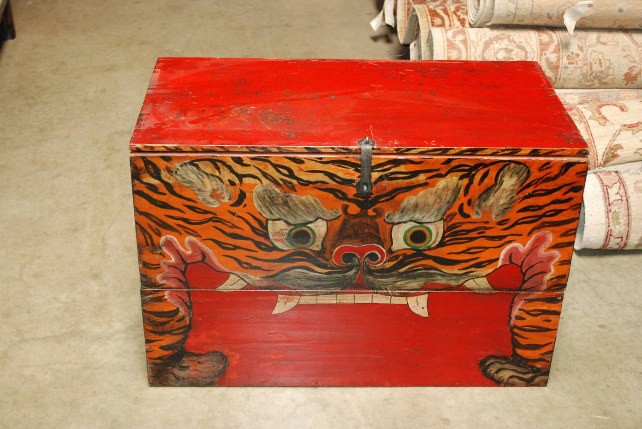 Country: Mongolia.
Period: circa 1900.

A pair of Mongolian painted tiger trunks.

Painted wood. Fine antique condition.

Dimensions: 33 1/2 W x 17 3/4 D x 22 1/2 H.