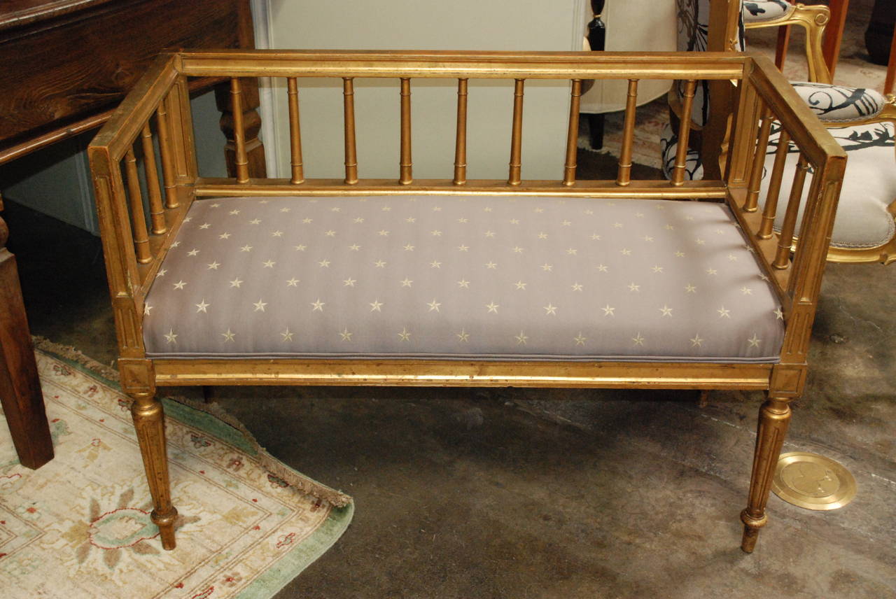 Swedish gilded Gustavian style bench. Features new upholstery.