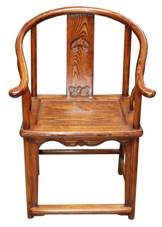 Pair of Chinese Ming “Style” chairs with horseshoe-shaped backs, extended arms, squared legs and stretchers.