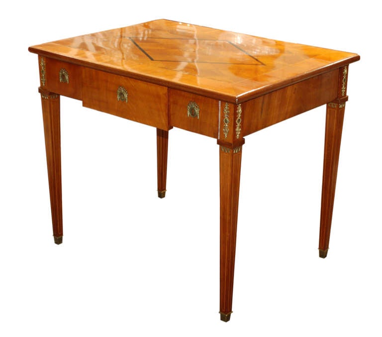 Mahogany desk from Denmark circa 1830. Inlaid diamond pattern on table top and the initial 