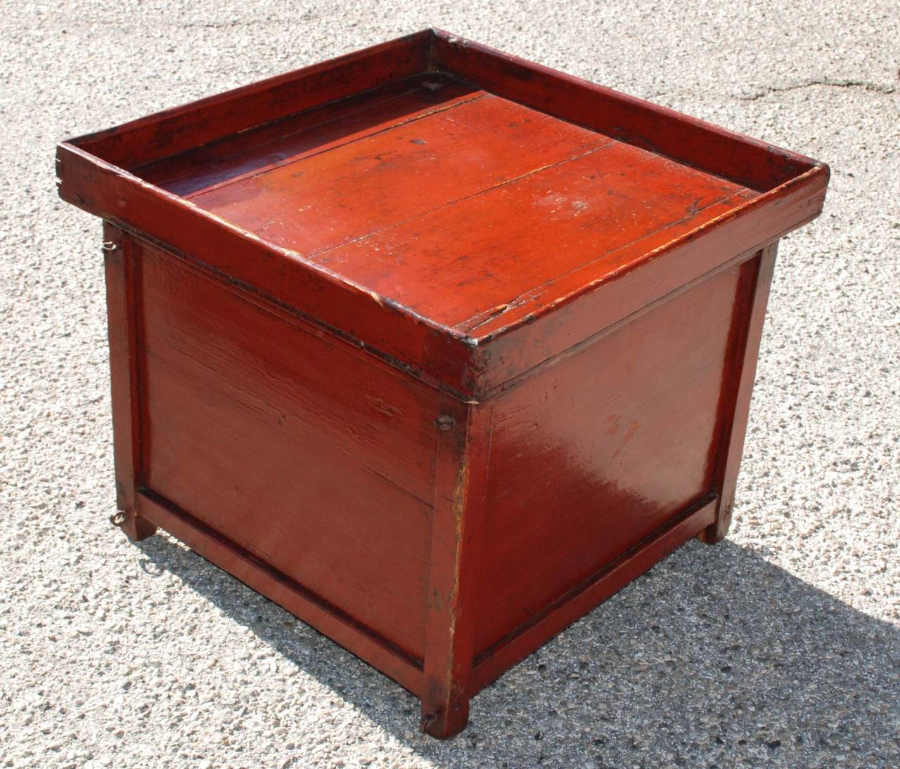 Chinese Peddler’s box with a red cinnabar finish and a removable tray top above two doors. Believed to have been used by a noodle vendor.