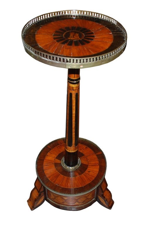 Napoleon III occasional table, the top  with a marquetry central medallion portraying Antoine-Francois Momoro, the Parisian printer and Hebertist organizer, crying out liberty, surrounded by a ring of tulipwood and a second ring of ebony, contained