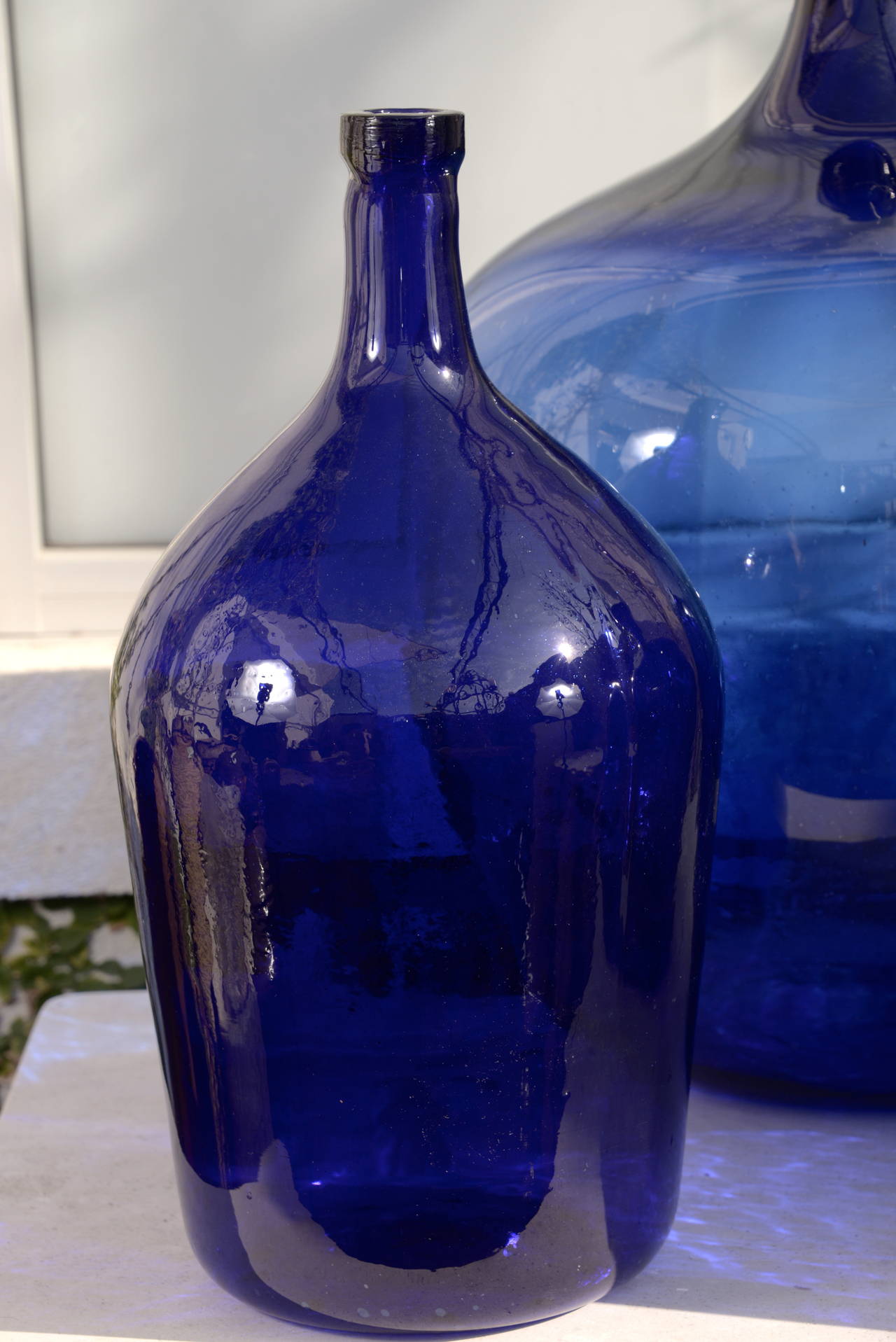 Rare Cobalt Blue Dame-Jeanne are unusual due to their 