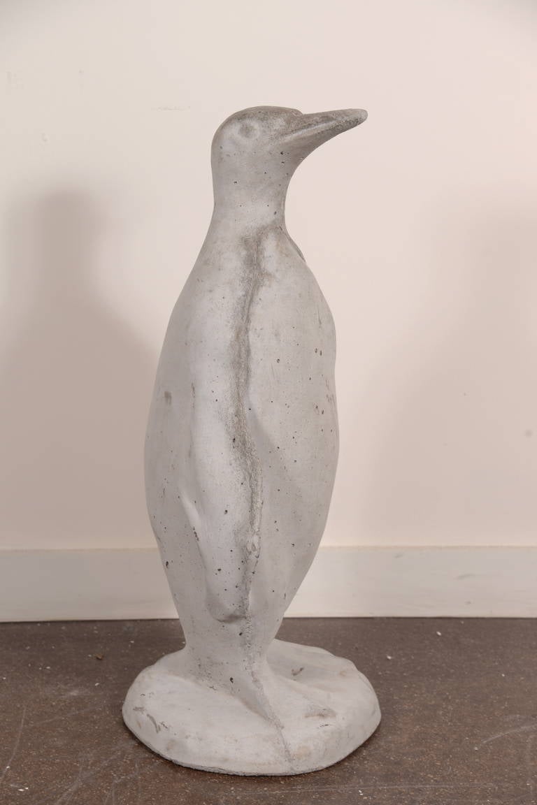 Cast stone garden penguin statue 

From an array of one a kind collectibles, Brendan discovered this vintage handmade cast stone statue. Originally used in a green house for garden decor in the 1950s in Paris, France. 

This one of a kind