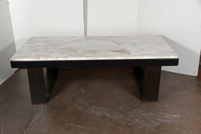 Antique French Carrara marble top as wooden mount with iron supports.