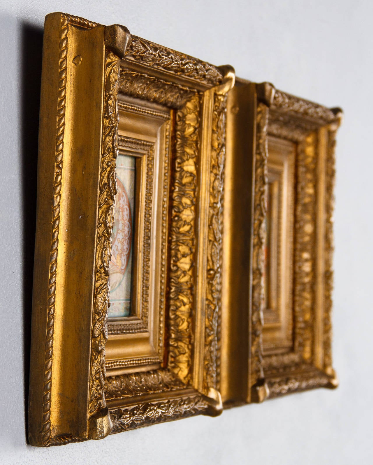A beautiful Pair of gold leaf wooden French Art Nouveau Frames with art prints dating to the Art Nouveau era.