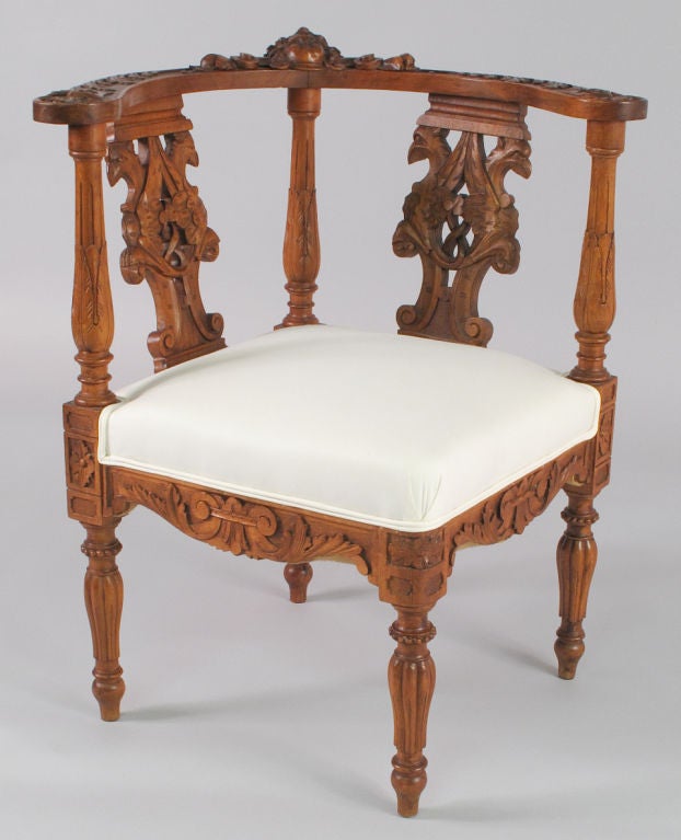 This Renaissance style Corner Chair dates from the late 1800's during the Renaissance Style Revival, also called Neo-Gothic.<br />
These types of Chairs were designed to be placed in a bedroom corner.  They are also called 