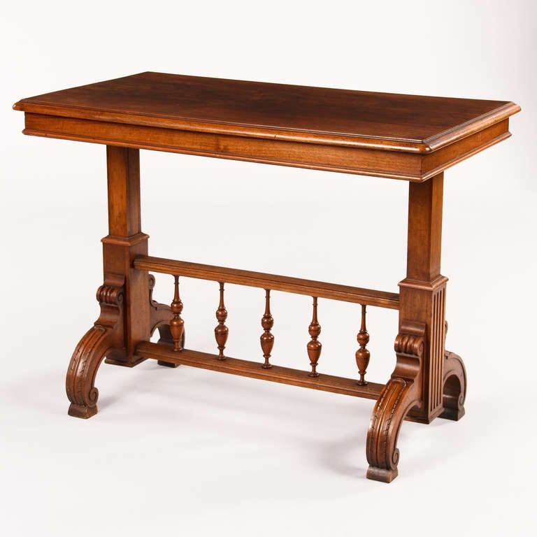 A very unusual Table Desserte in the Henri II style made of walnut wood. The thick top has a mechanism that allows to lift it up becoming a three-tiered Serving Table (Table is 41