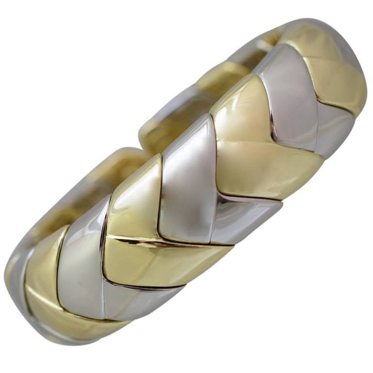Gold Cuff Bracelet!
18k two tone gold link bracelet with a herringbone pattern.
It is very comfortable and flexible links
Total weight is 118 grams