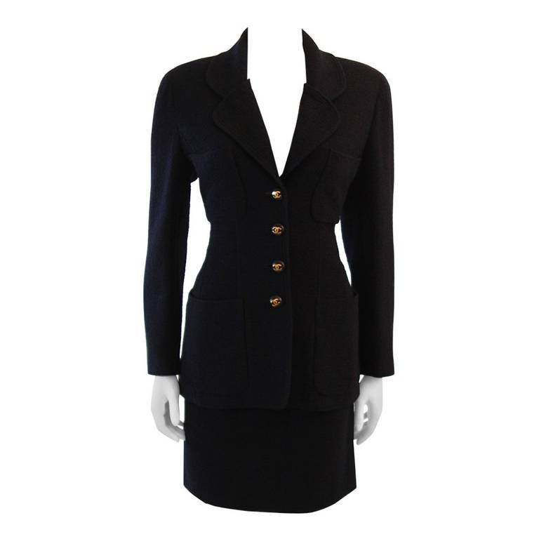 1993 C Chanel Navy Boucle Jacket and skirt suit with CC logo buttons