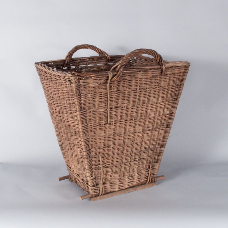 A tall wicker Basket that was used to carry grapes in the Rhone Region.