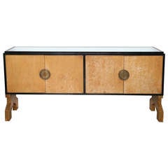 An Italian Modern Parchment Front 4 Door Credenza by Aldo Tura