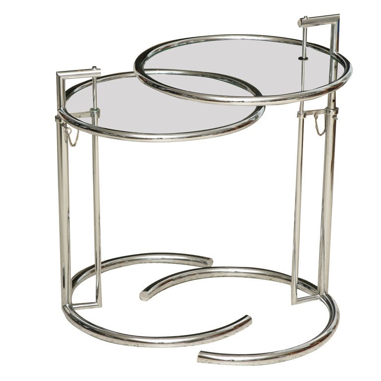 A Pair of Eileen Gray Polished Chrome and Glass Tables For Sale