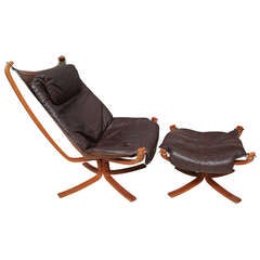 A Sigurd Resell Falcon Chair and Ottoman