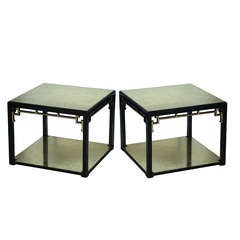 A Pair of Ebonised and Parcel Gilt Tables, Maison Jansen