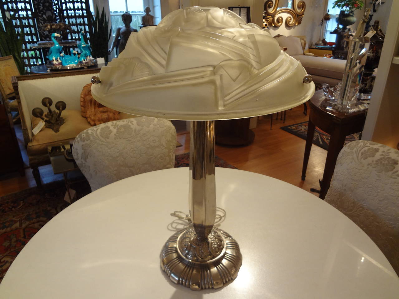 French Art Deco nickeled bronze table lamp with frosted glass shade, newly wired for U.S. Market.

Please click KIRBY ANTIQUES logo below to view additional pieces from our vast inventory.