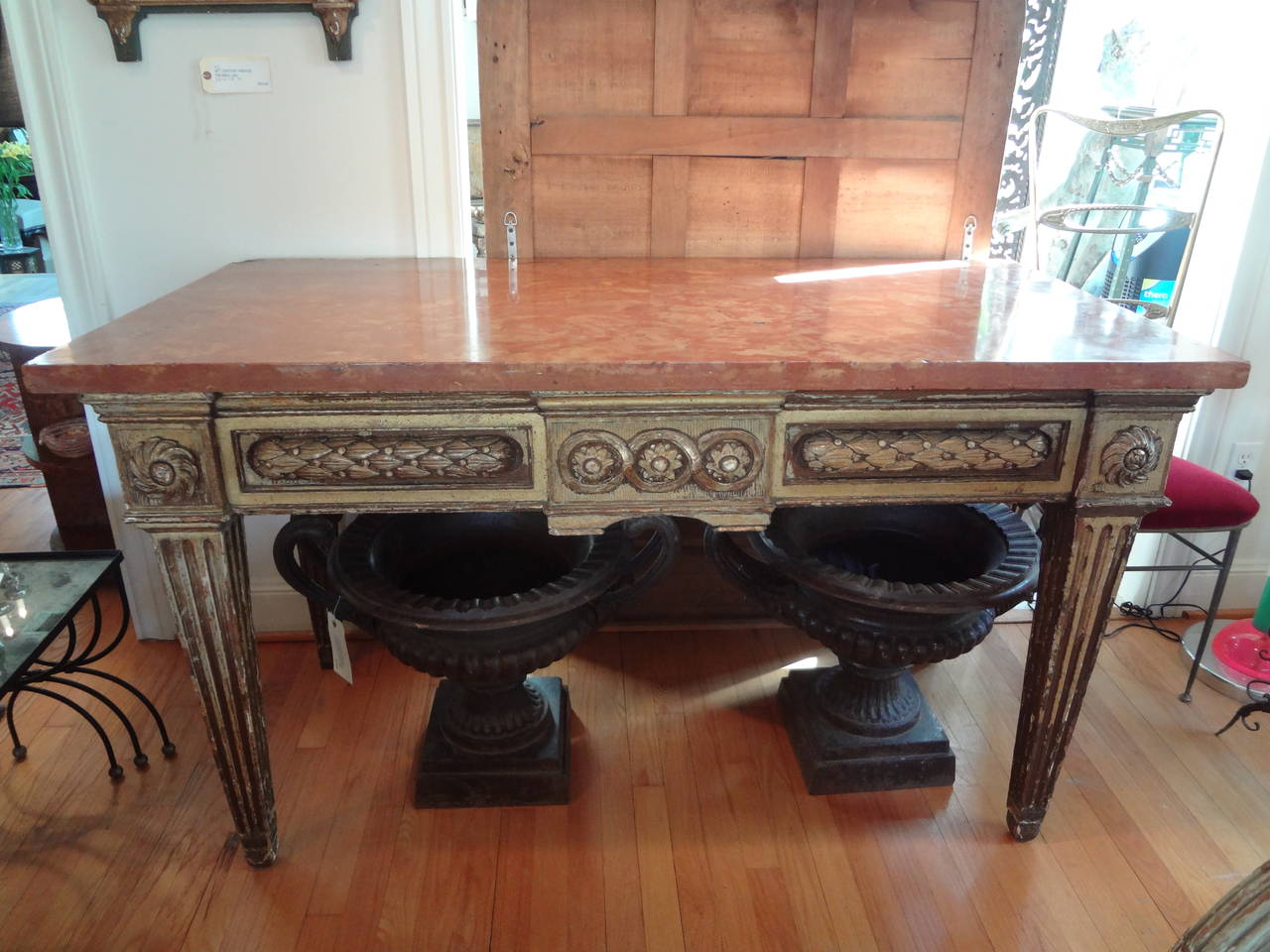 17th century Italian Neoclassical style gilt wood console table with marble top.
Sensational Italian Neoclassical style gilt wood console table or center table with 1.5 inch thick marble top from the 17th century. This magnificent antique Italian