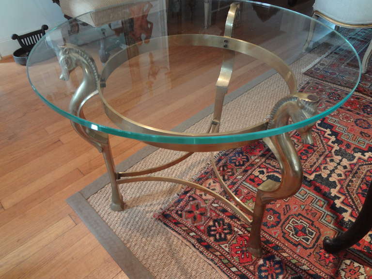 Late 20th Century Round Italian Brass Table with Seahorse Supports and Glass Top