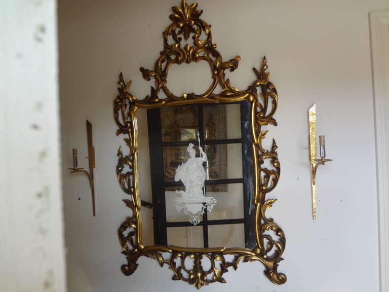 Italian Louis XV Style Gilt Wood Mirror With Églomisé/Reverse Decorated Classical Figure, Circa 1920.

Please click KIRBY ANTIQUES logo below to view additional pieces from our vast inventory.