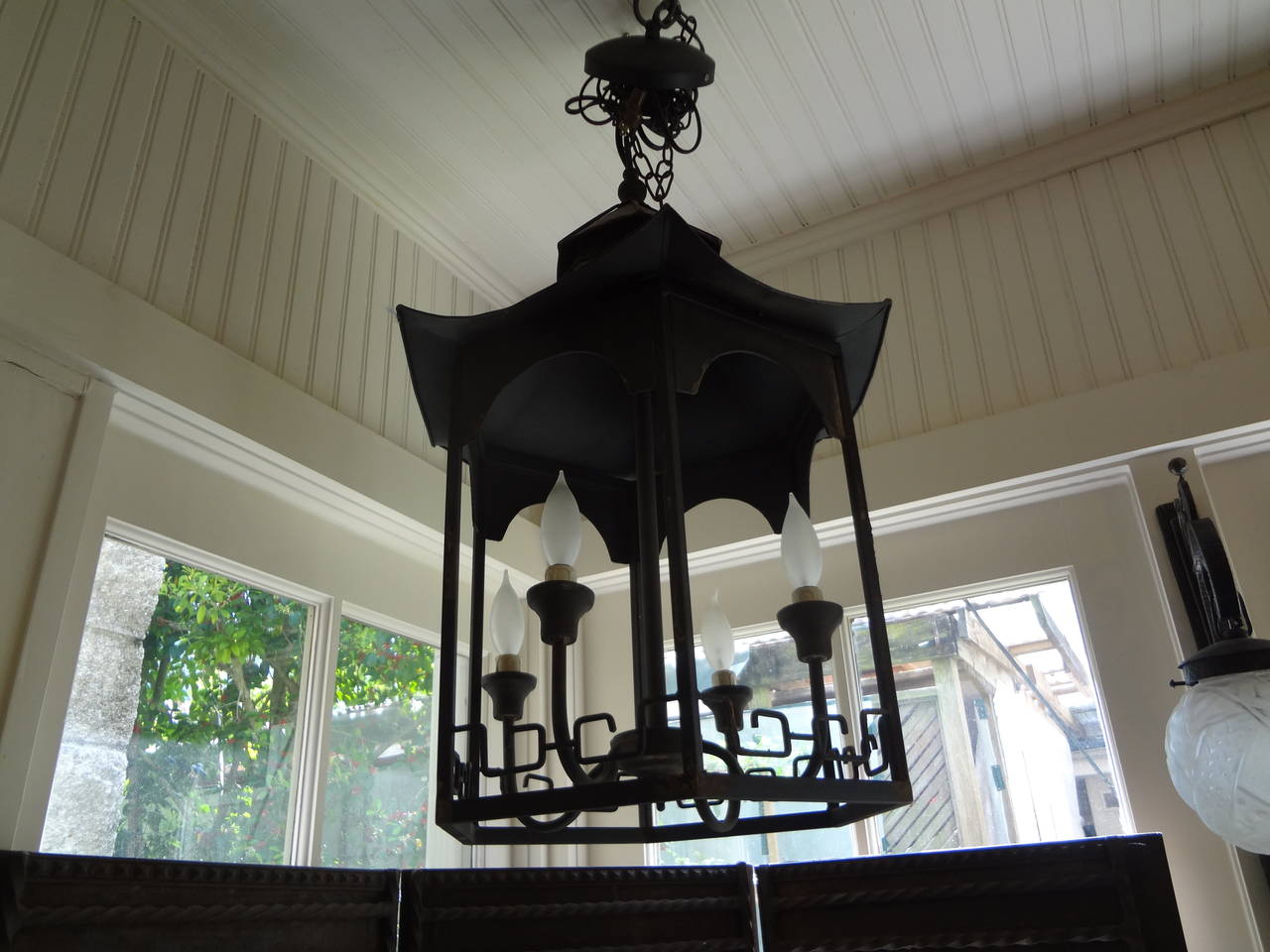 Great pair of pagoda or chinoiserie shaped iron lanterns.