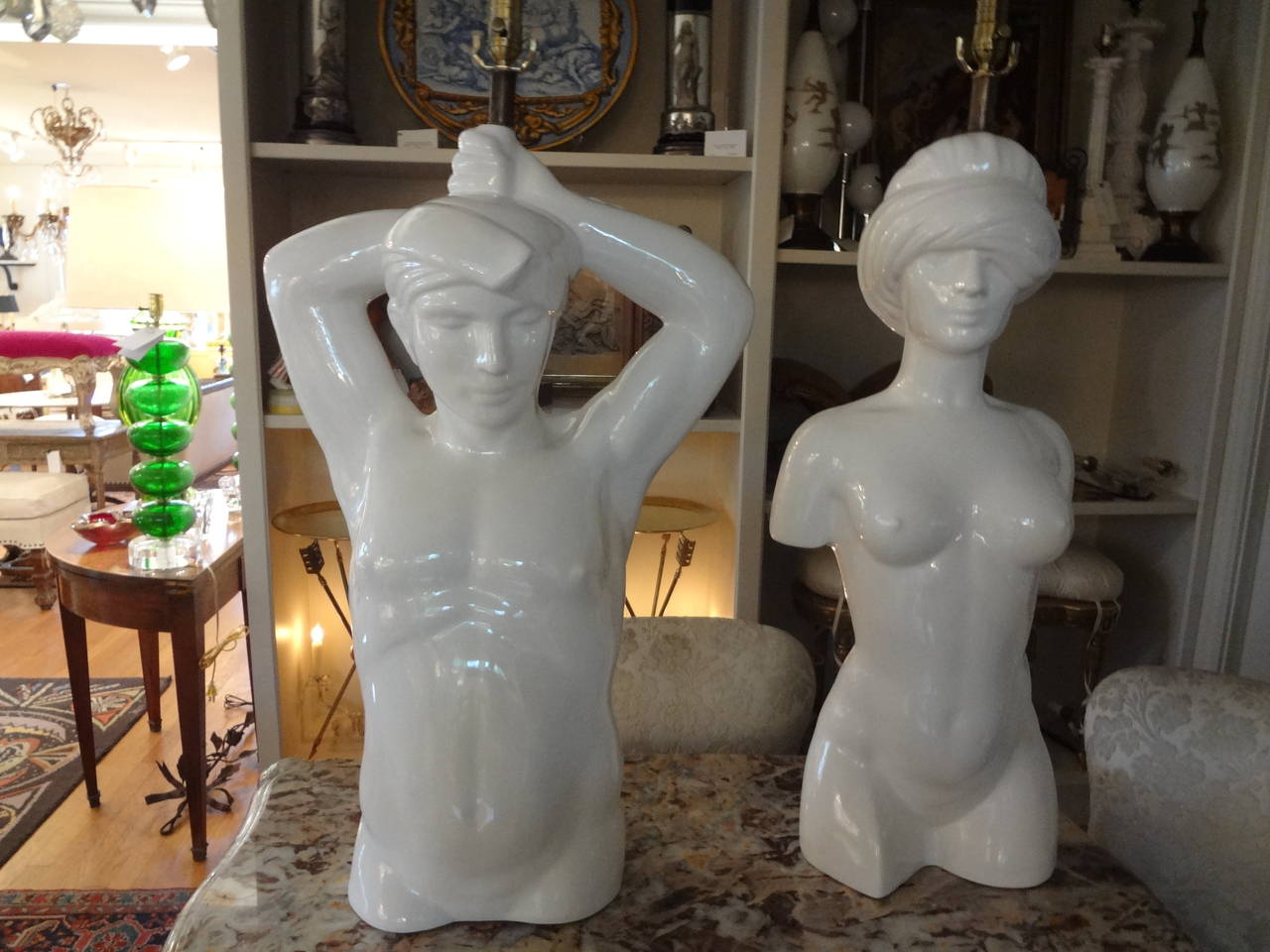 Pair of whimsical Mid-Century Modern Italian opposing male and female glazed pottery torso lamps.

Please click KIRBY ANTIQUES logo below to view additional pieces from our vast inventory.
 