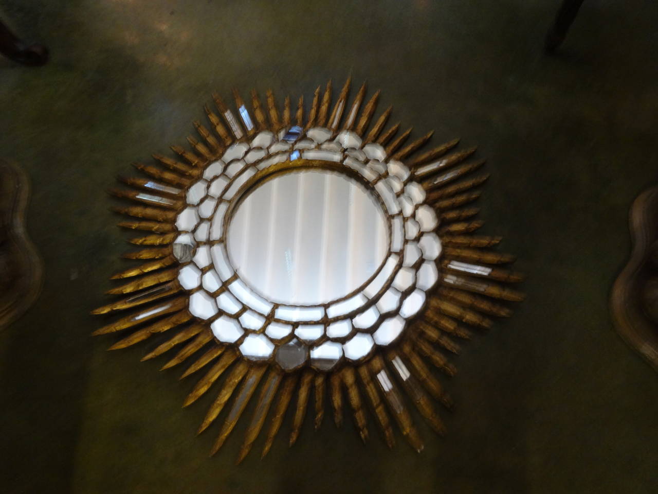 Chic Italian Gilt Wood Sunburst Mirror.

Please click KIRBY ANTIQUES logo below to view additional pieces from our vast inventory.