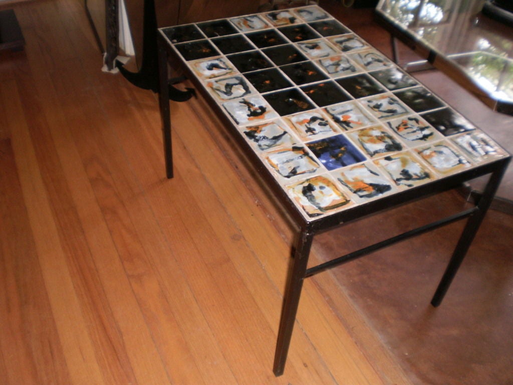 Midcentury Capron inspired tile topped wrought iron coffee table or cocktail table. This great vintage iron table could also be used as a side table or end table. Perfect for a black and white interior.